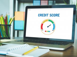 picture of laptop with credit score illustration